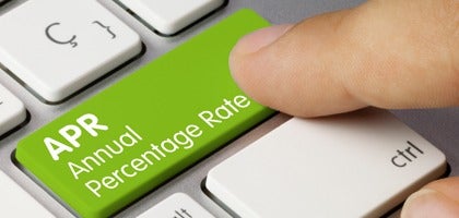 image of a green button on a keyboard that says APR Annual Percentage Rate